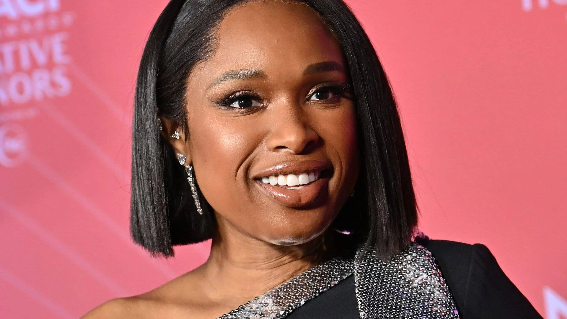 Jennifer Hudson's rarely-seen son David, 16, towers over famous mom in new photo 